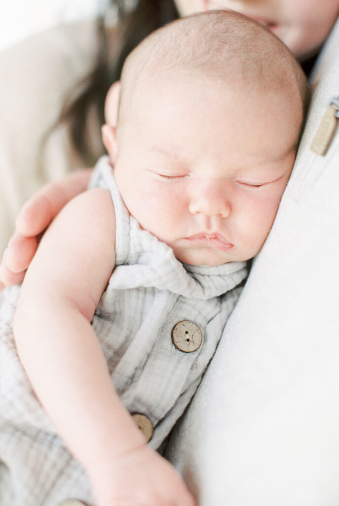 sleepy newborn baby by Orlando FL photographer