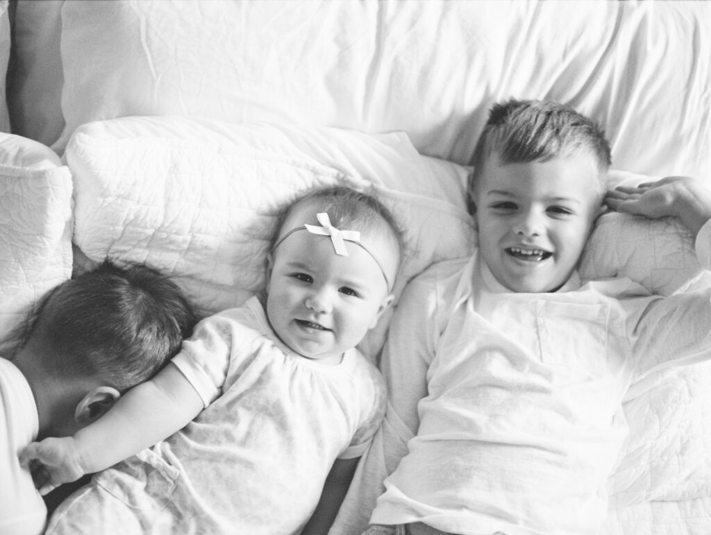 children smiling up at camera by Orlando lifestyle photographer