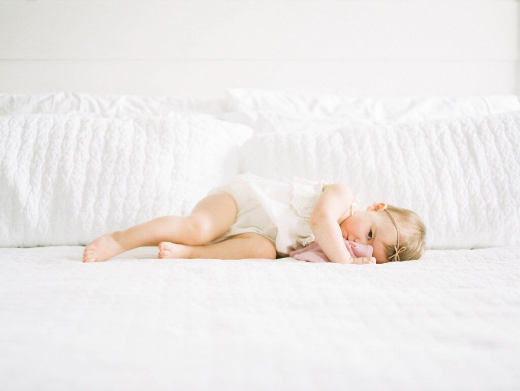 baby snuggling blanket by Orlando newborn photographer