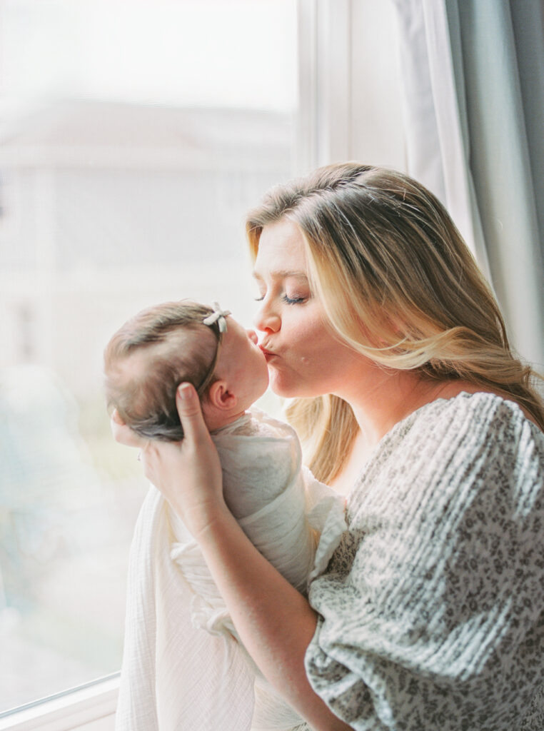 A light and airy in home newborn session in Orlando, FL.