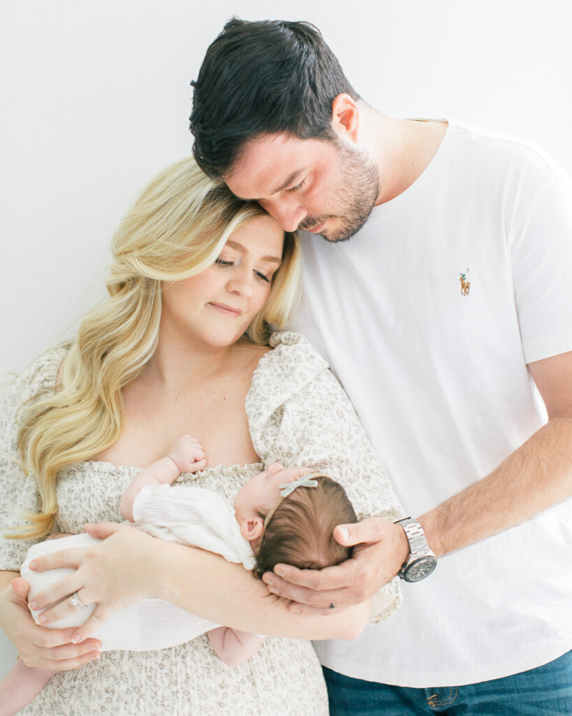 A light and airy in home newborn session in Orlando, FL.