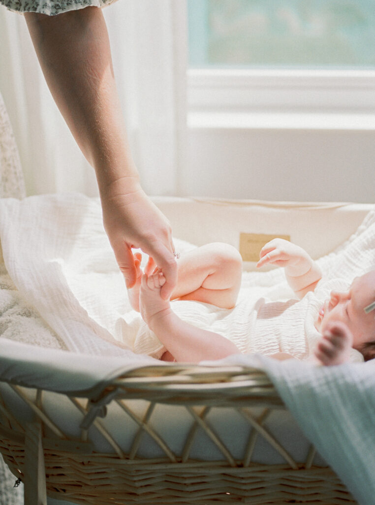 A light and airy in home newborn session in Orlando, FL.