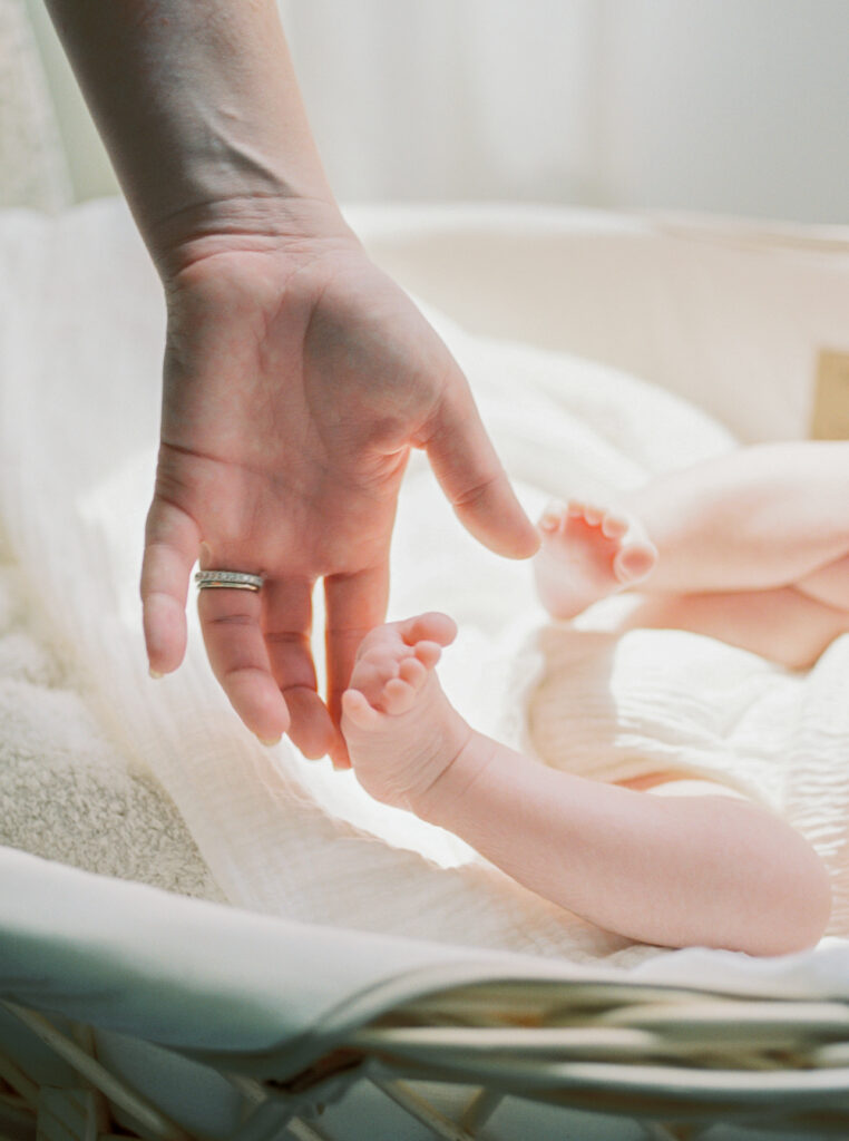 A light and airy in home newborn session in Orlando, FL.