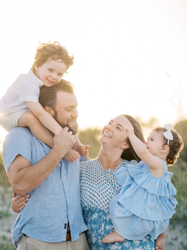 A sun soaked family beach session by Orlando lifestyle photographer. 