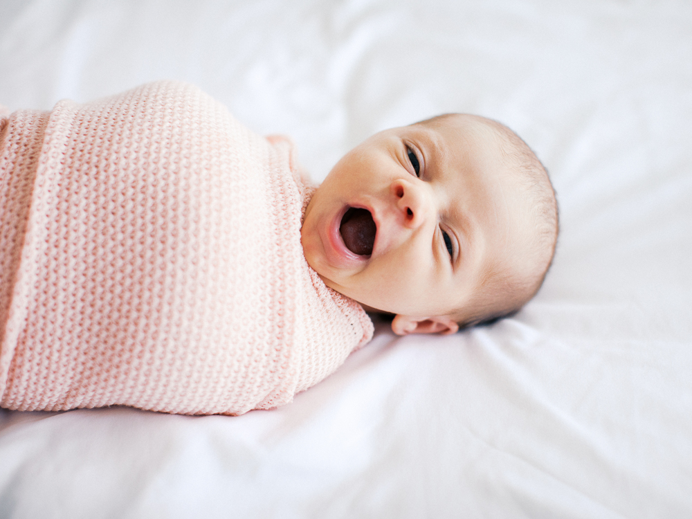 New baby yawning by Orlando newborn photographer