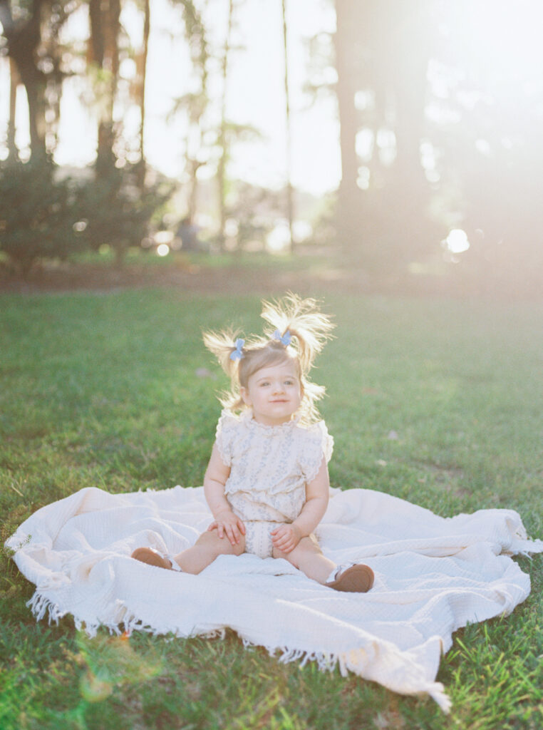 Light filled 1 year old family session by Orlando newborn photographer.