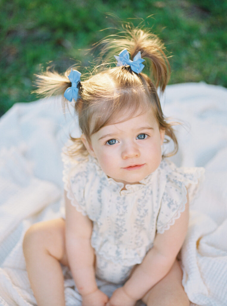 Light filled 1 year old family session by Orlando newborn photographer.