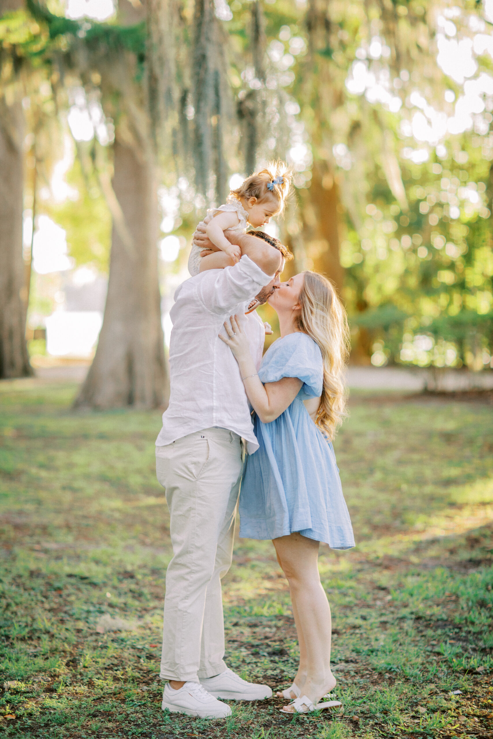 Light filled 1 year old family session by Orlando newborn photographer.