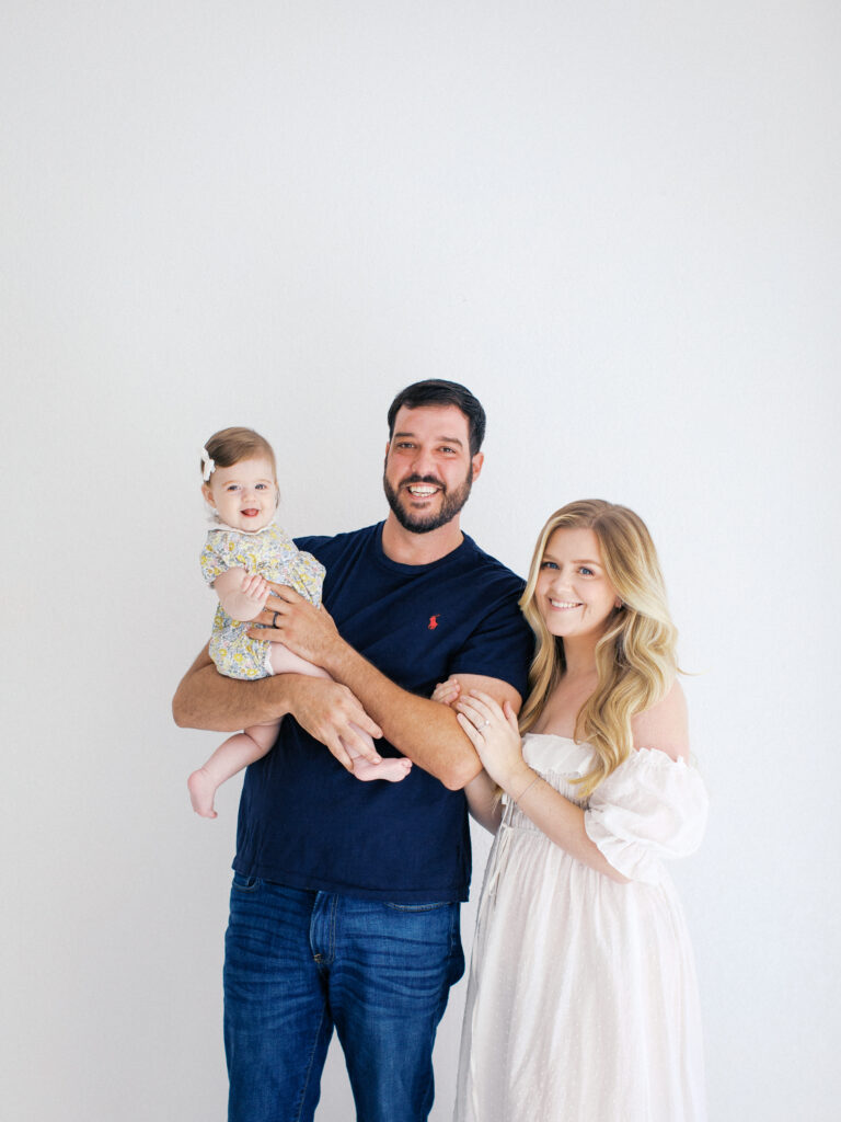 A six month family session in studio by Orlando newborn photographer.