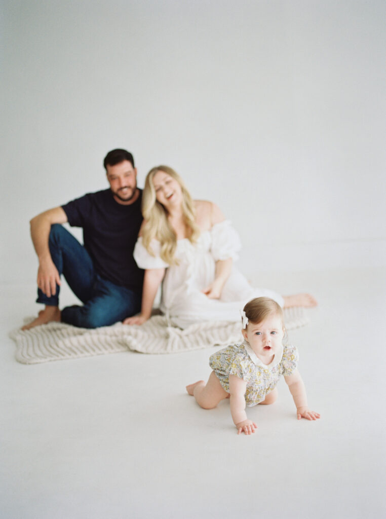 A six month family session in studio by Orlando newborn photographer.
