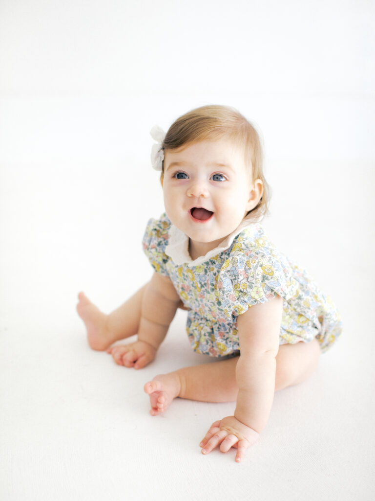 A six month family session in studio by Orlando newborn photographer.