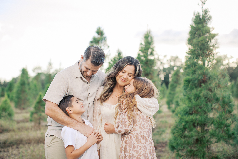 Family holiday portrait sessions at the Christmas tree farm in Orlando, FL.