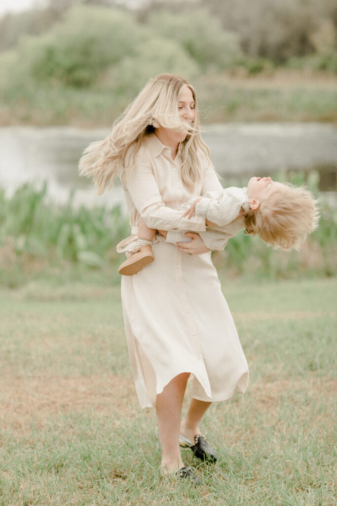 Joyful moment during a natural lifestyle photoshoot with Orlando family photographer.
