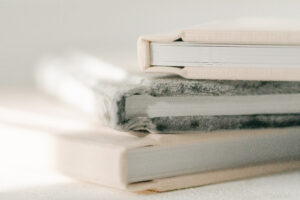 Heirloom Album with luxurious linen or velvet cover in soft neutral tones, handcrafted by an Orlando family photographer.