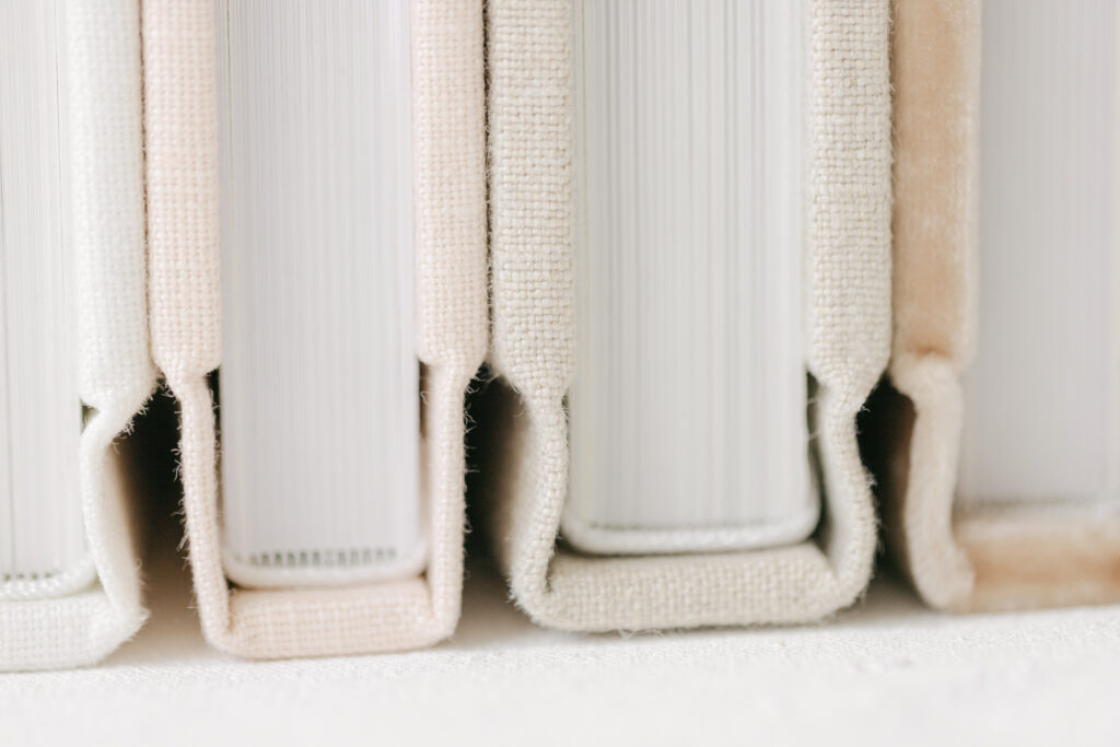 Heirloom Album filled with printed portraits from an Orlando photography session.