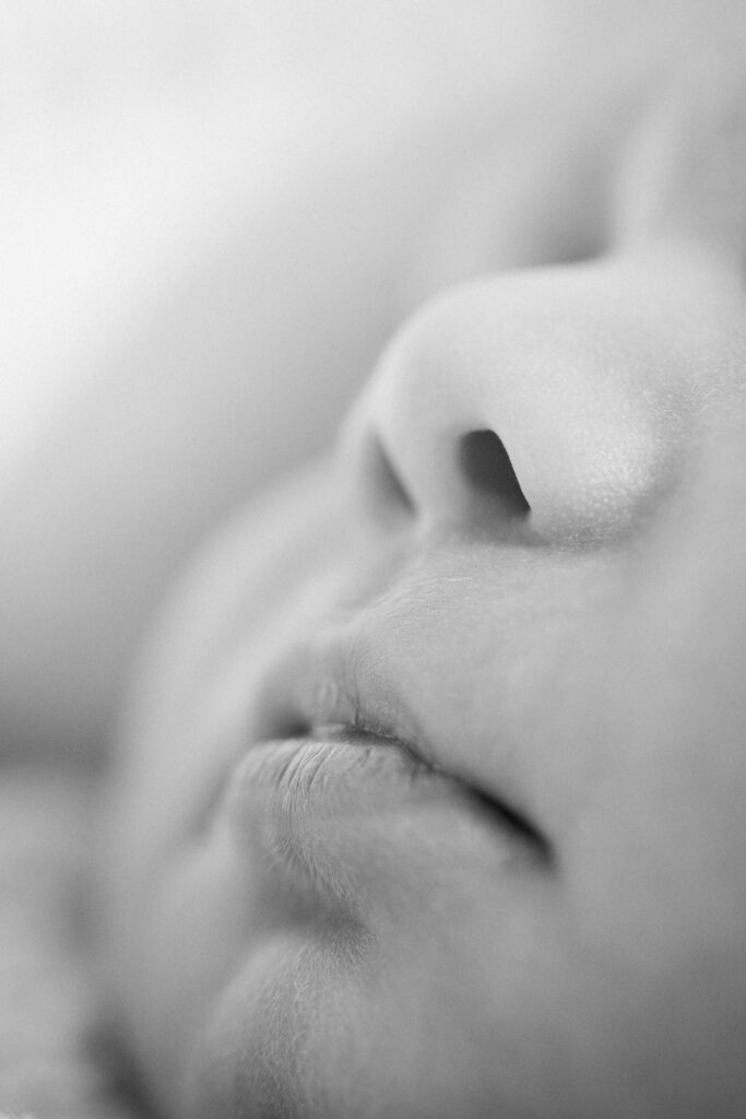 Newborn detail photo of baby lips by Orlando lifestyle photographer.