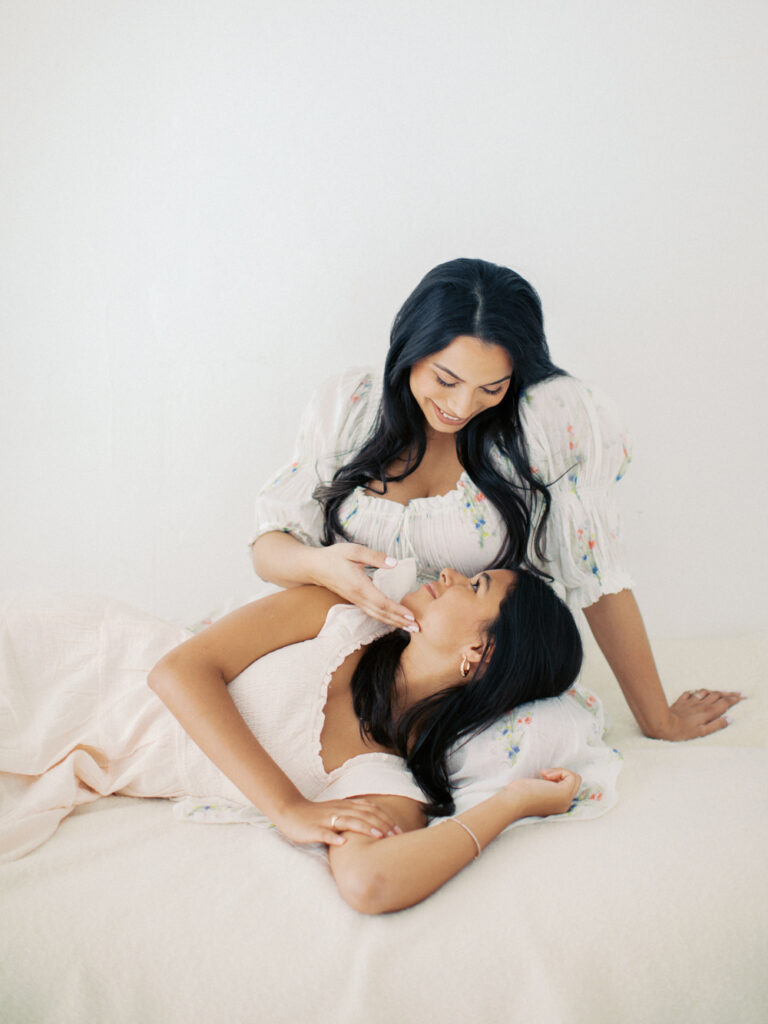A touching moment between mom and her daughter at a family session by Orlando lifestyle photographer.