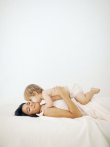 Sister and brother in a sweet moment at a family session by Orlando lifestyle photographer.