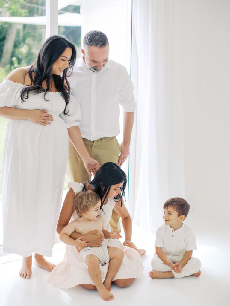 Light filled maternity session with a beautiful family at home in Orlando.