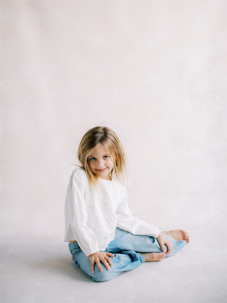Portraits featuring a little girls personality with a minimal backdrop.