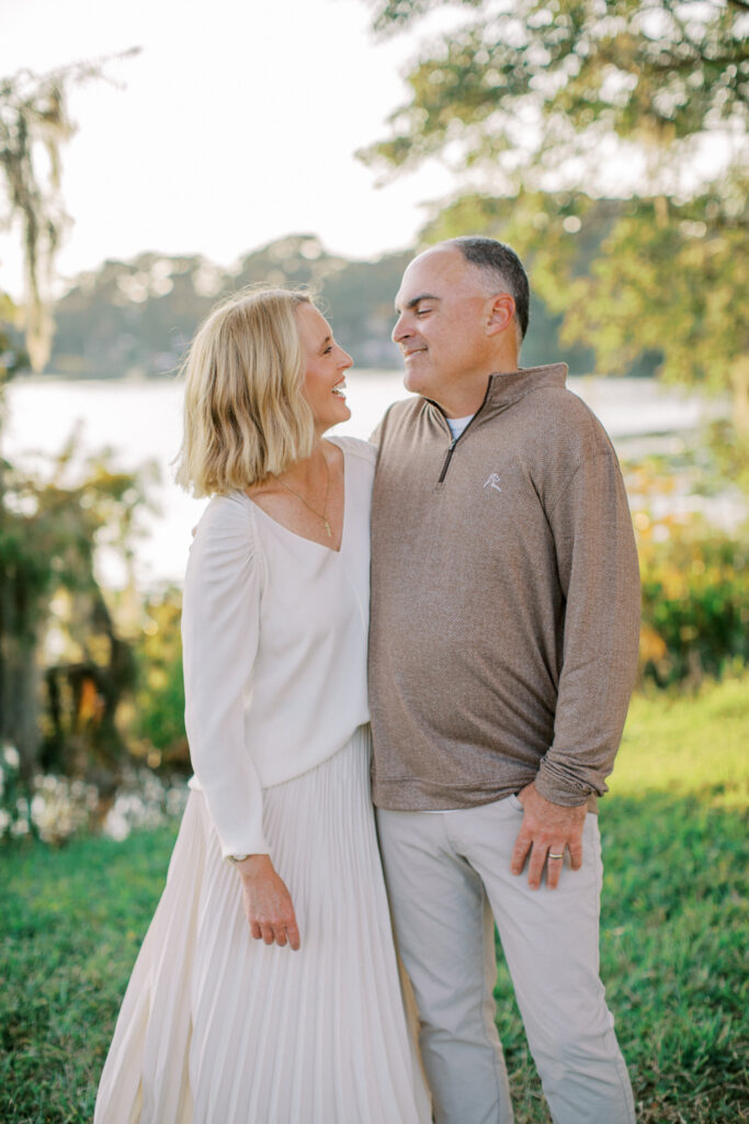 A laughter filled moment for mom and dad by Orlando family photographer.