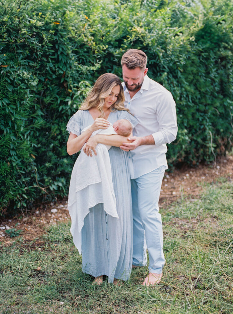 Mom and dad with their new baby at home in Orlando, FL.
