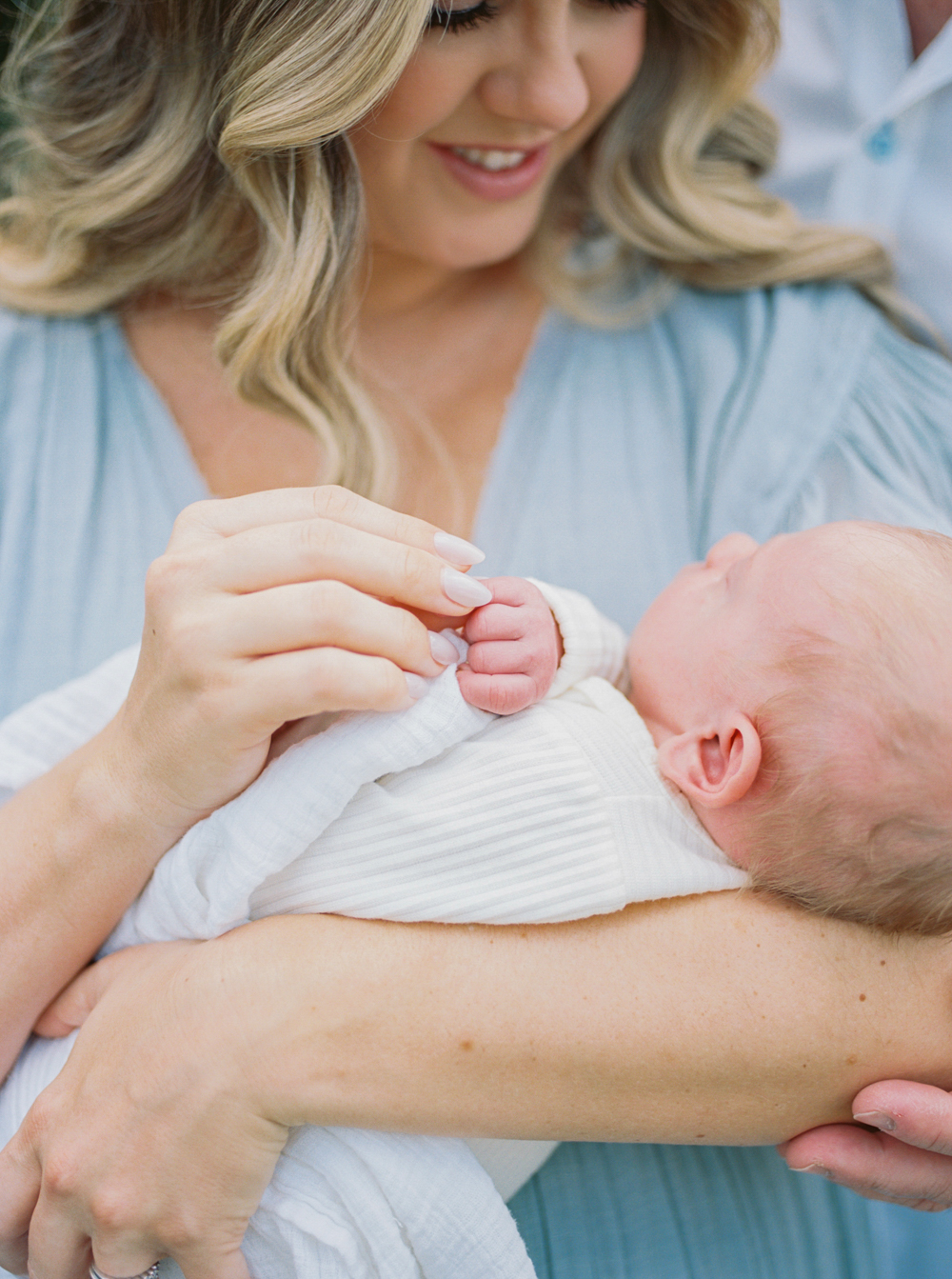 Outdoor photo at an in home newborn session by Orlando newborn photographer.