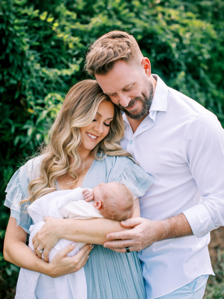 Mom and dad in the yard with their new baby in Orlando, FL. 