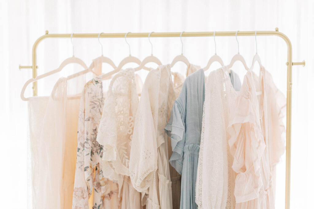 Curated client wardrobe options available for mothers and babies by Orlando maternity for the full-service photography experience. 