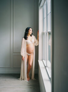 Light filled maternity portraits in Orlando, FL.