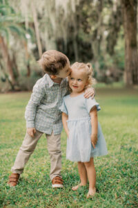 Sweet sibling moment during a beautiful family session in Orlando.