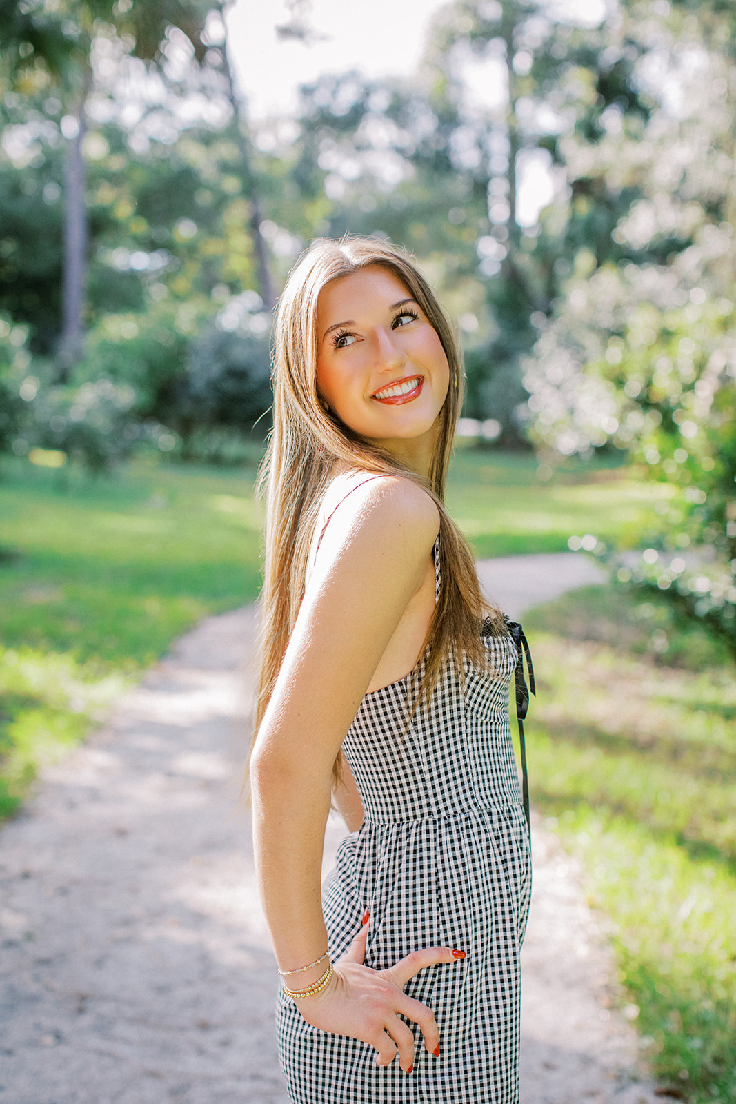 Light filled senior portraits in Orlando.