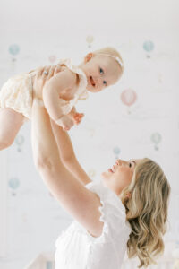 A one year milestone session captured at baby's first home.