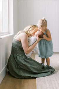 Beautiful emotive in home newborn session by Orlando newborn photographer.