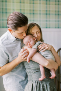 Beautiful emotive in home newborn session by Orlando newborn photographer.