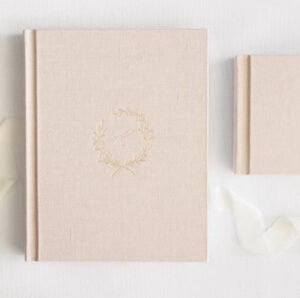 Family heirloom album bound in lux linen with matching mini album.