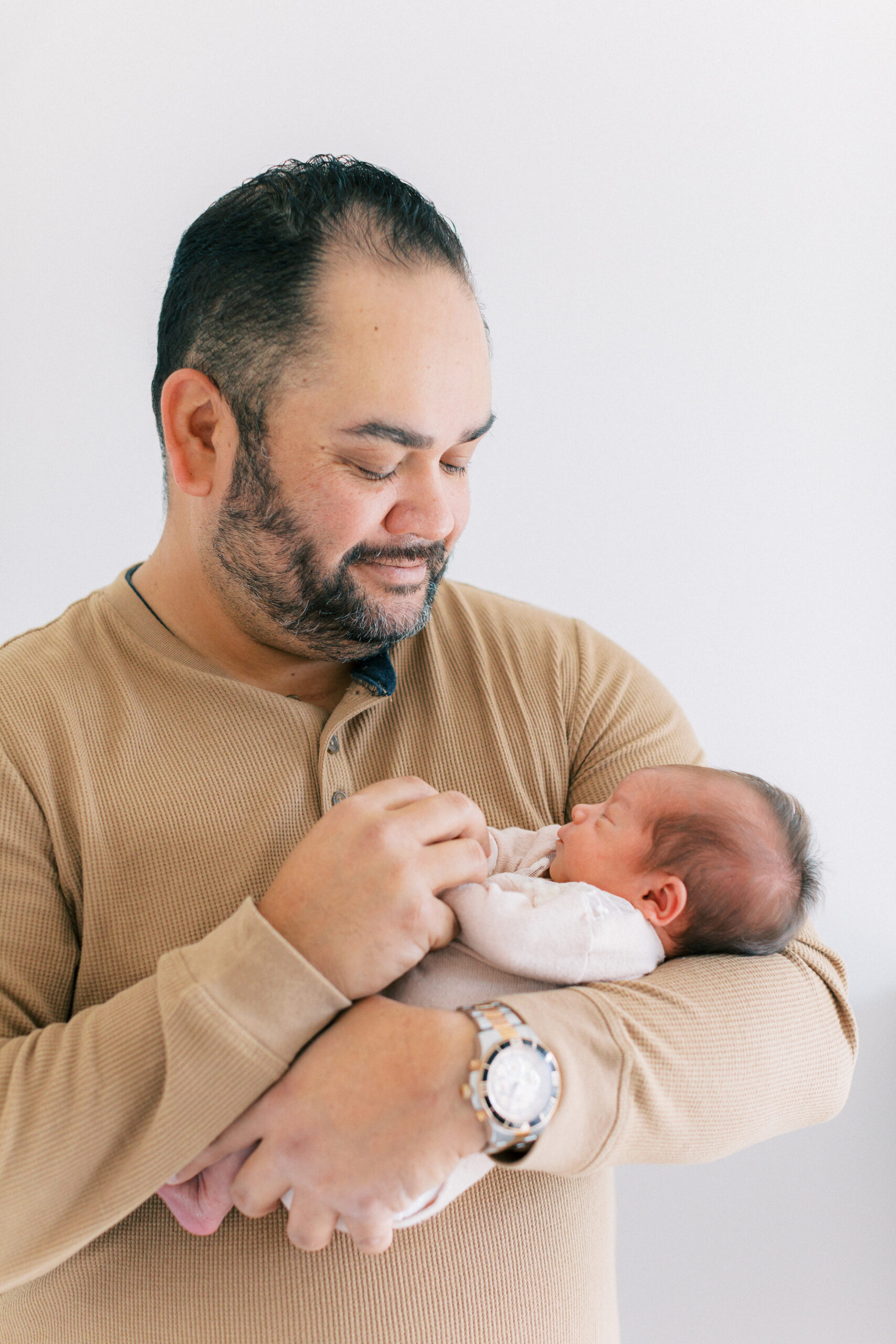 From newborn to first birthday, by Rooted Love Photography.